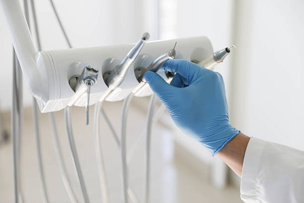 Professional Emergency Dentist technician working in Holmes County County, OH
